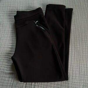 Brown leggings with zippered front pockets